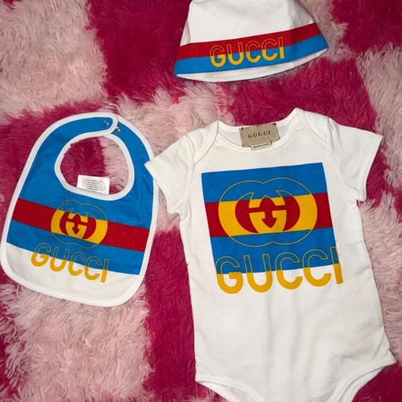Gucci Kids' White Bib, Onesie And Beanie Set with Blue, Red, and Yellow Accents - Picture 3 of 7